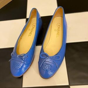 Chanel ballet flats.